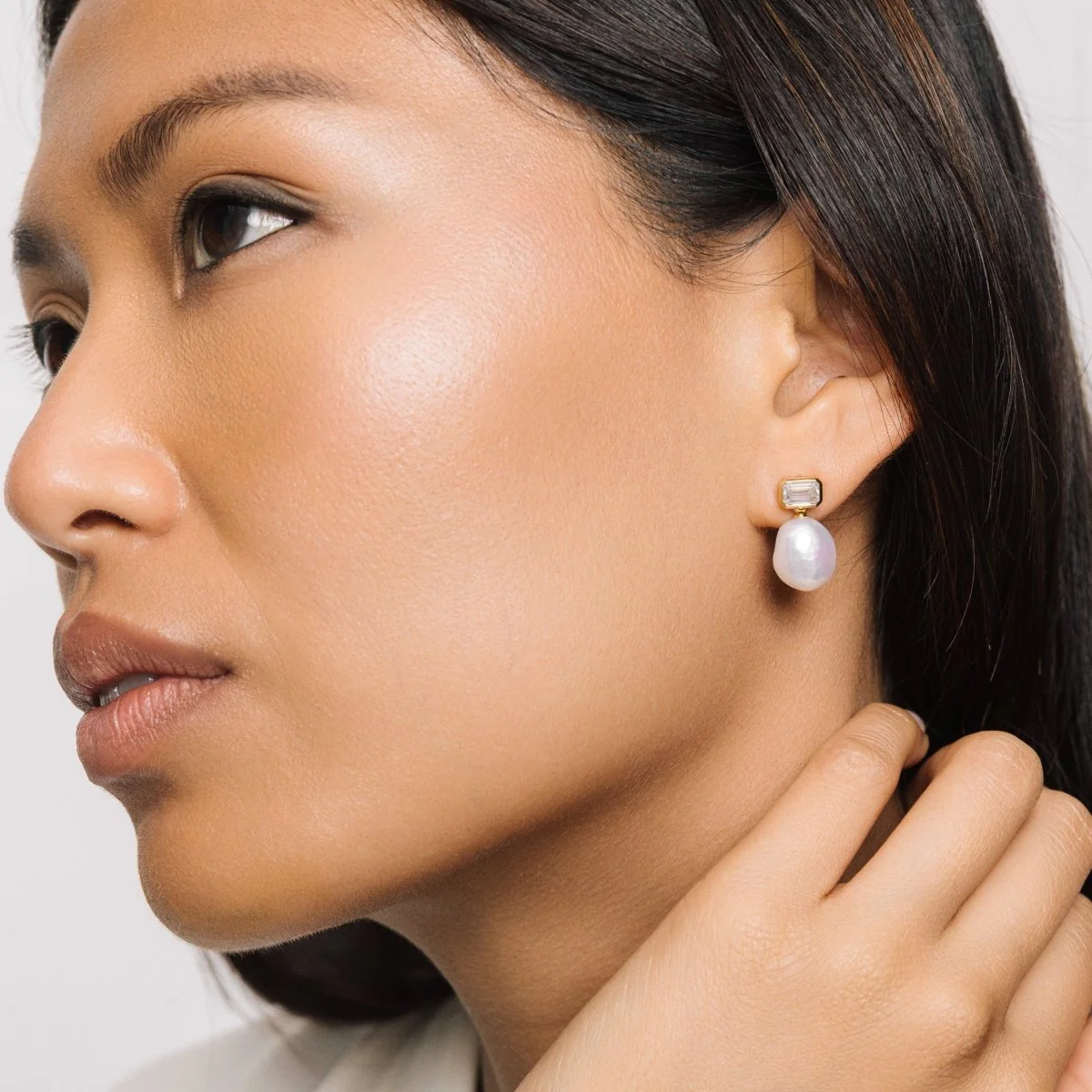 Pearl Drop Stud Gold Earrings with Baguette Cubic Zirconia - Image 3