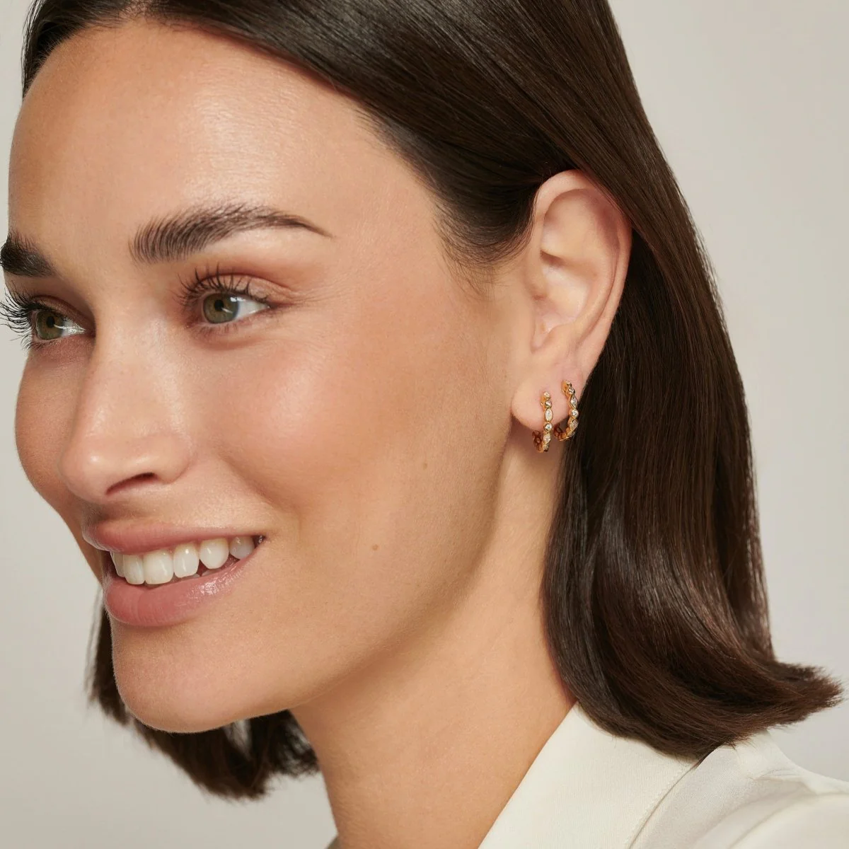 Teardrop Silver Small Hoop Earrings with Cubic Zirconia - Ripple - Image 4